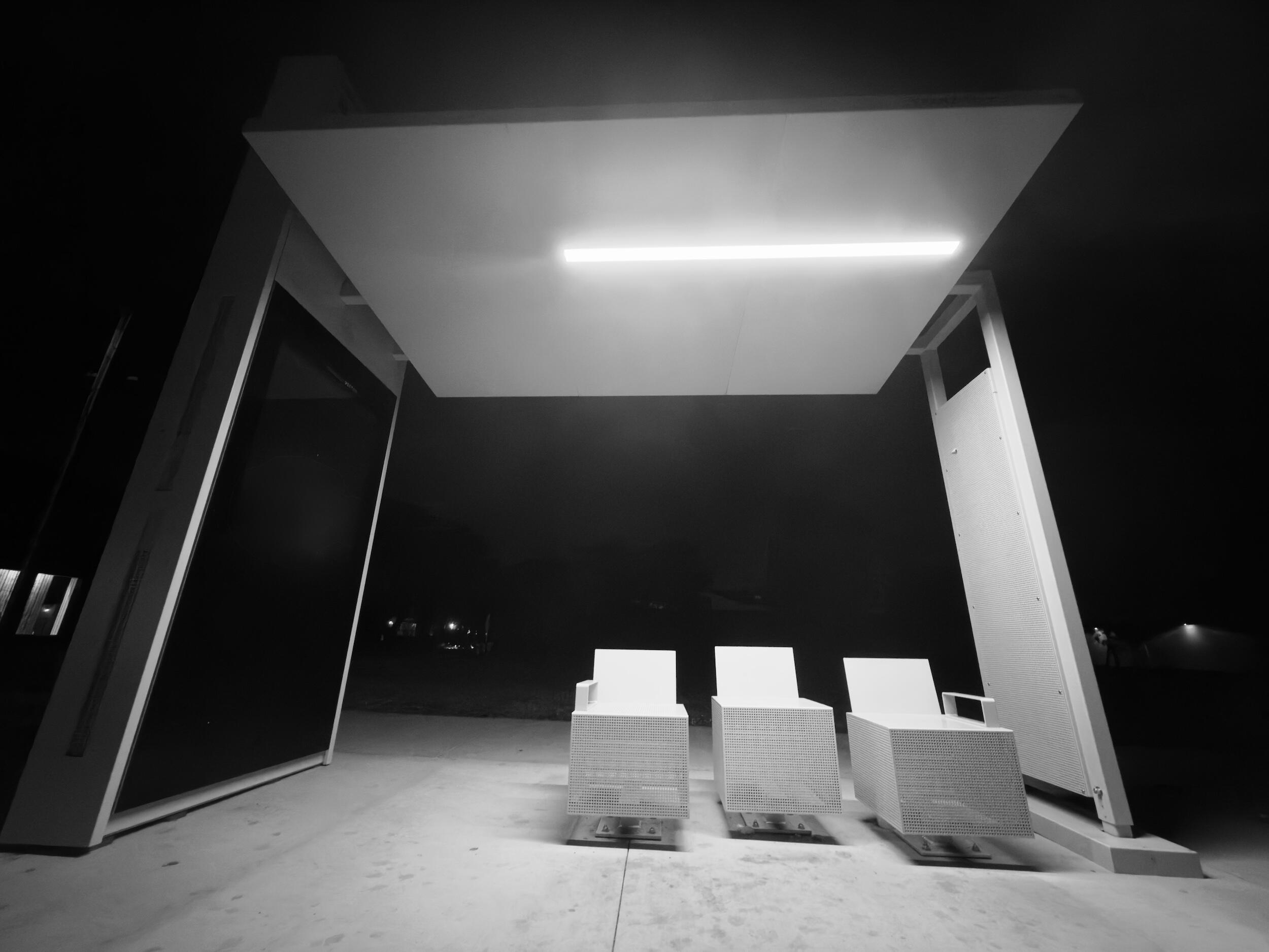 bus stop - shadow | LA - Cinematic Industrial Noir. High Contrast Night Photography. 1/1 Unique Artifact Archival Print by Barton Caplan