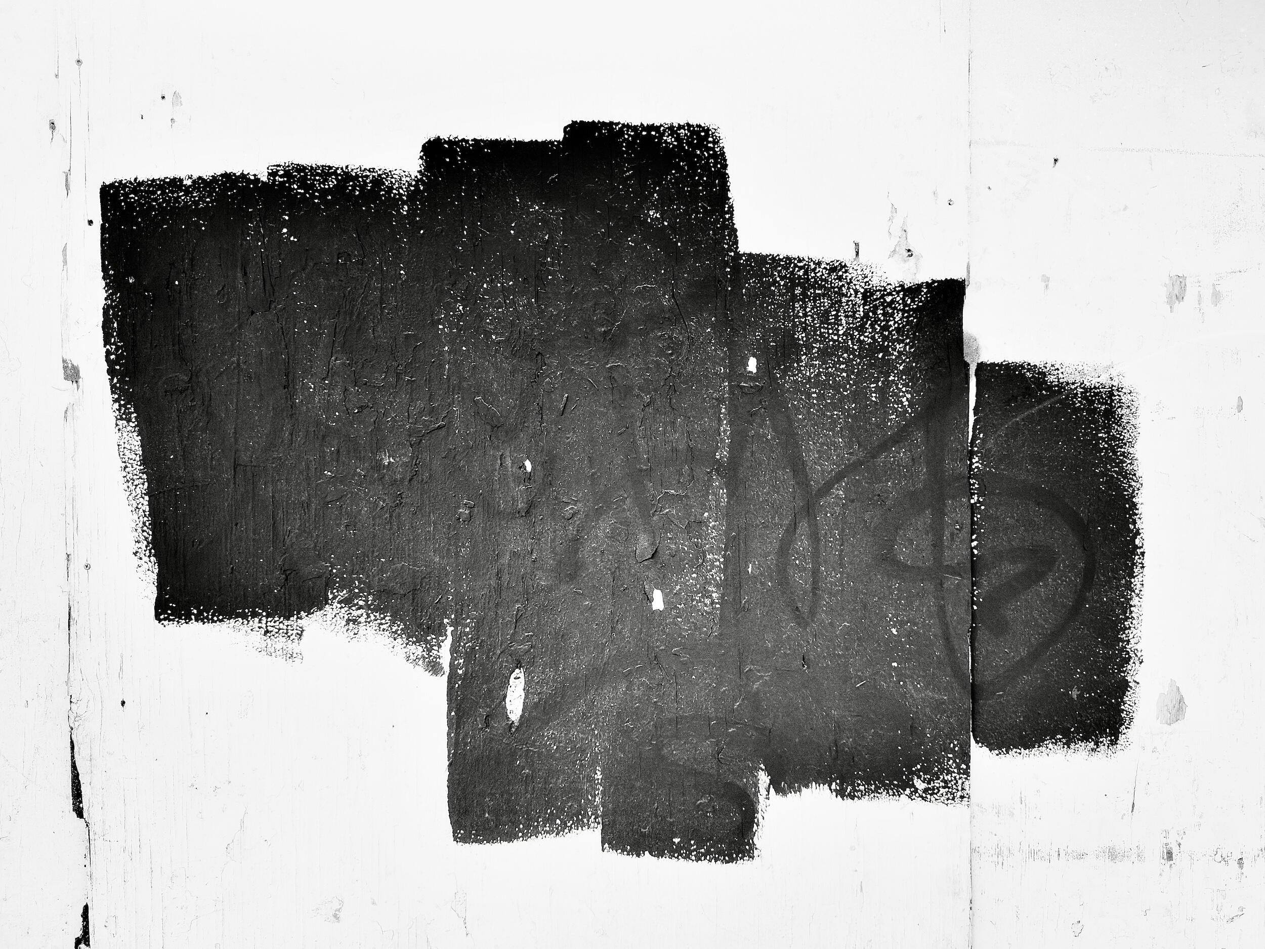 lateral - glyph | LA - A photo featuring a monolithic black shape with rich surface texture. Industrial noir black-and-white photography, Los Angeles, California. 1/1 archival pigment print by Barton Caplan